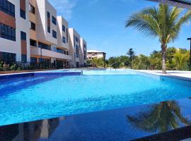 Guarajuba Cond Paraiso dos Coqueiros，位于卡马萨里的酒店