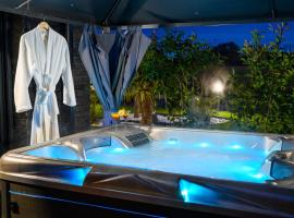 TOPAZE Nuitée Romantique avec Jacuzzi, alojamento com cozinha em Moyvillers