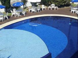 Charme Hotel Guarujá Frente Mar โรงแรมในกัวรูจา