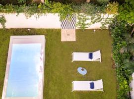 SorrentoVibes - Luxury Apartment with Garden and Pool, Hotel in Sant'Agnello