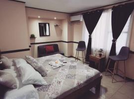 Toucan Hostel, hotel en Alajuela