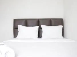 Homey 2BR Majesty Apartment near Maranatha University By Travelio