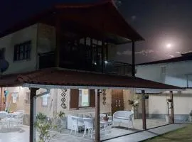Casa em frente a praia de Jaconé