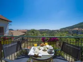 Apartment with terrace in Pianillo – 65 sqm, garden view