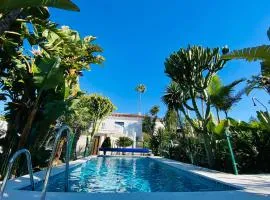 Apartments with tropical garden and sea water pool
