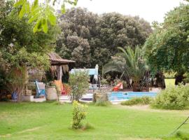 Big relax apartment with swimming pool and a peaceful garden in a private villa