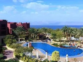 Gorgeous Pool View Apartment - Tala Bay Resort, Aqaba