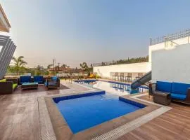 StayVista's White Pebbles - A Villa with Theater Room & Swimming Pool