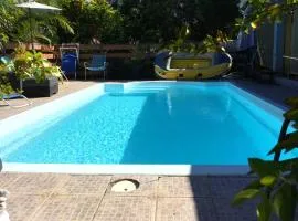 Villa chaleureuse près de Le Tampon avec piscine partagée
