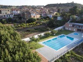 Casa Ca lEster Terra alta Matarraña, allotjament vacacional a Caseras