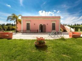 Villa I Giardini di Marzo, hotel con estacionamiento en Guagnano