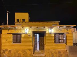 Hosteria Las Tinajas, užmiesčio svečių namai mieste Tilkara