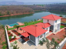 Casa Paun by StayVista - A lake-view villa with Infinity pool, Modern interiors & an amphitheatre – dom wakacyjny w mieście Nethersole Dam