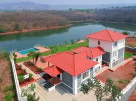 Casa Paun by StayVista - A lake-view villa with Infinity pool, Modern interiors & an amphitheatre