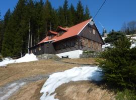 Roubenka u vleku, hotel v Josefově Dole