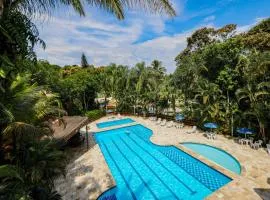 Fabuloso flat 243 Amarílis 2 piscinas climatizadas, carregador veiculo elétrico Riviera de São Lourenço, Bertioga Apartamento Duplex inteiro, cozinha equipada completa, serviço de praia, limpeza e trocas diária de toalhas, wi-fi 500mb