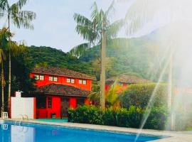 Chales Terra Pura, lodge en Camburi