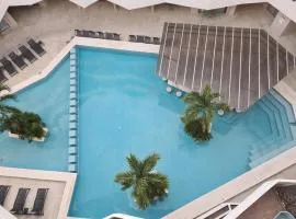 Discover Playa del Carmen from The Gallery Condos steps to the beach