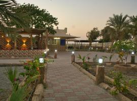 Elaf Resort 4 Bed room luxury resort، فندق مع موقف سيارات في Al Muladdah