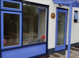 Vakantiehuisje Te Gast op Texel, casa rústica em Den Burg