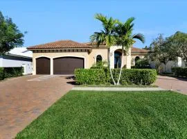 Waterfront home with pool, spa and outdoor kitchen