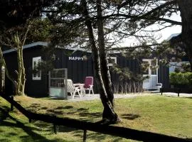 Bungalow Happy, vakantiewoning op loopafstand van strand & duinen!
