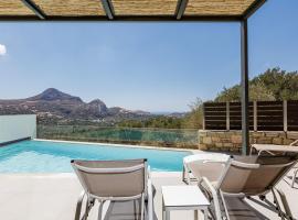 Porti Villas Iraklis, хотел в Asómatoi
