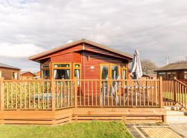 Flamingo Lodge With Hot Tub, poilsiautojų namelis mieste Moltonas