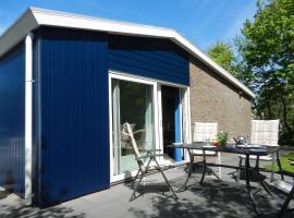 Detached bungalow in Nes on Ameland with spacious terrace, hotel in Nes