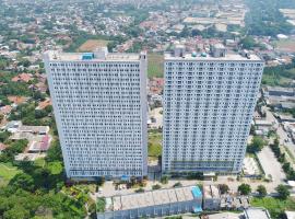 Apartemen Gunung Putri Square by Sirooms, departamento en Bogor