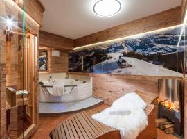 TraumChalet mit Sauna in Kirchberg im Skigebiet Kitzbühel, hotel dengan kolam renang di Kirchberg in Tirol