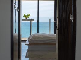 BEACH FRONT VILLA, hotel em Baisha