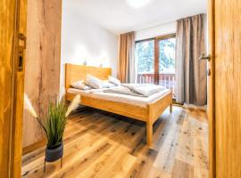 Apartments Srdiecko - JASNA South, FOREST View, SAUNA in One Apt FIREPLACE in Both, hotel in Tale