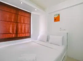 Simply Cozy 2BR Bassura City Apartment By Travelio