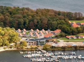 6 person holiday home on a holiday park in Gr sten: Gråsten şehrinde bir otel