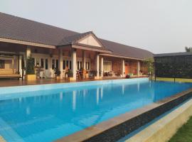 Coconut Garden Retreat, hotell i Samut Songkhram