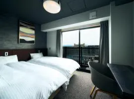Rakuten STAY Kyoto Station Twin Room with ceiling projector