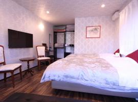 Yatsugatake Guest House Matsuda House - Vacation STAY 11086: Hokuto şehrinde bir otoparklı otel