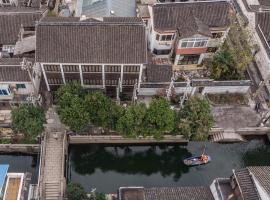 Suzhou Jade Snow Lodge, ubytování v soukromí v destinaci Su-čou
