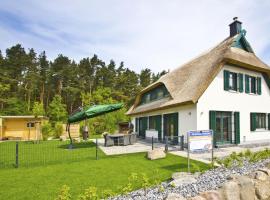 Ferienhaus Seehund Haus - Terrasse, Garten, Sauna, aluguel de temporada em Klein Gelm