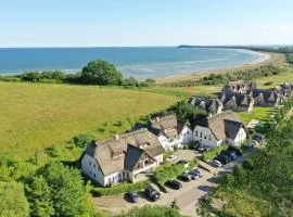 strandnah mit Terrasse, gratis Nutzung vom AHOI Erlebnisbad und Sauna in Sellin - Strandhaus Mönchgut FeWo09