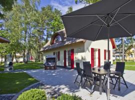 Haus Ostseesonne Haus - Terrasse, Garten, Sauna, hotel in Klein Gelm