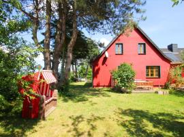 strandnahe, schicke FeWo mit Terrasse und Garten - Ferienwohnung Silas, hotel in Thiessow