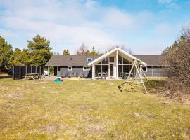 12 person holiday home in R m, hotel v mestu Bolilmark