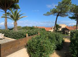 Mini villa climatisée - Vue mer - Mer à 50 m - Jardin et 2 terrasses 300 m2, maison de vacances à Lumio