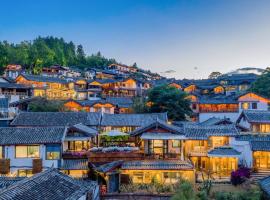 Lijiang Sunshine Nali Inn, готель у місті Ліцзян