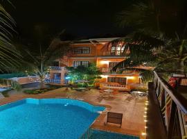 Resort Palmeiras Dourado, hotel en Cansaulim