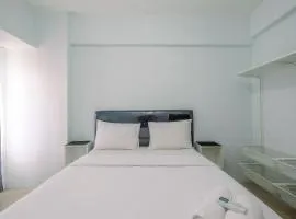 Cozy Stay 2BR Tamansari Mahogany Apartment By Travelio