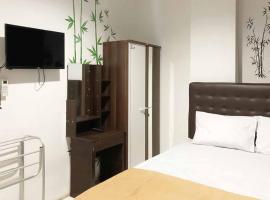 SAS Guest House Mitra RedDoorz At Darmo Park 2 Surabaya, hotel v oblasti Dukuh Pakis, Surabaja