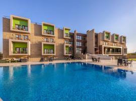 Dhara Residence E2 Lodge Hotel, hotel en Seis de Octubre